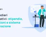Intermediari assicurativi: stipendio, provvigioni e sistema di fatturazione. Un consulente assicurativo al telefono, con un laptop sulla scrivania.